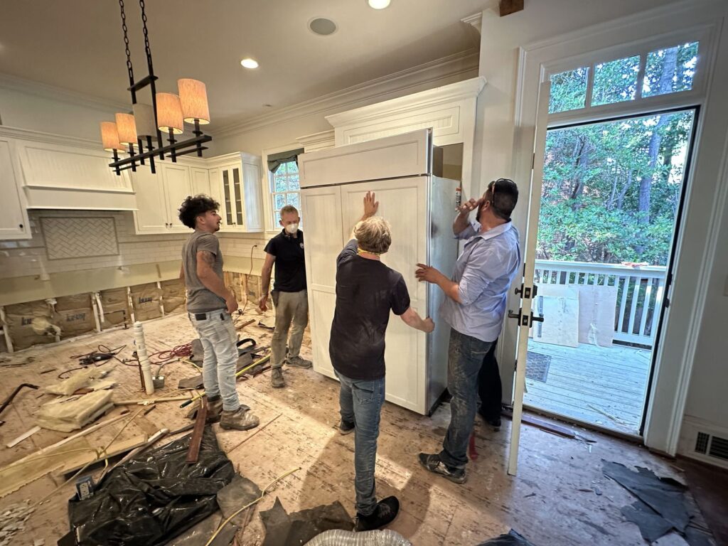 Property Restoration Pros team assessing a fire-damaged interior for reconstruction