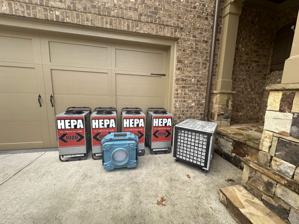 HEPA air scrubbers running to remove smoke and soot particles during fire restoration